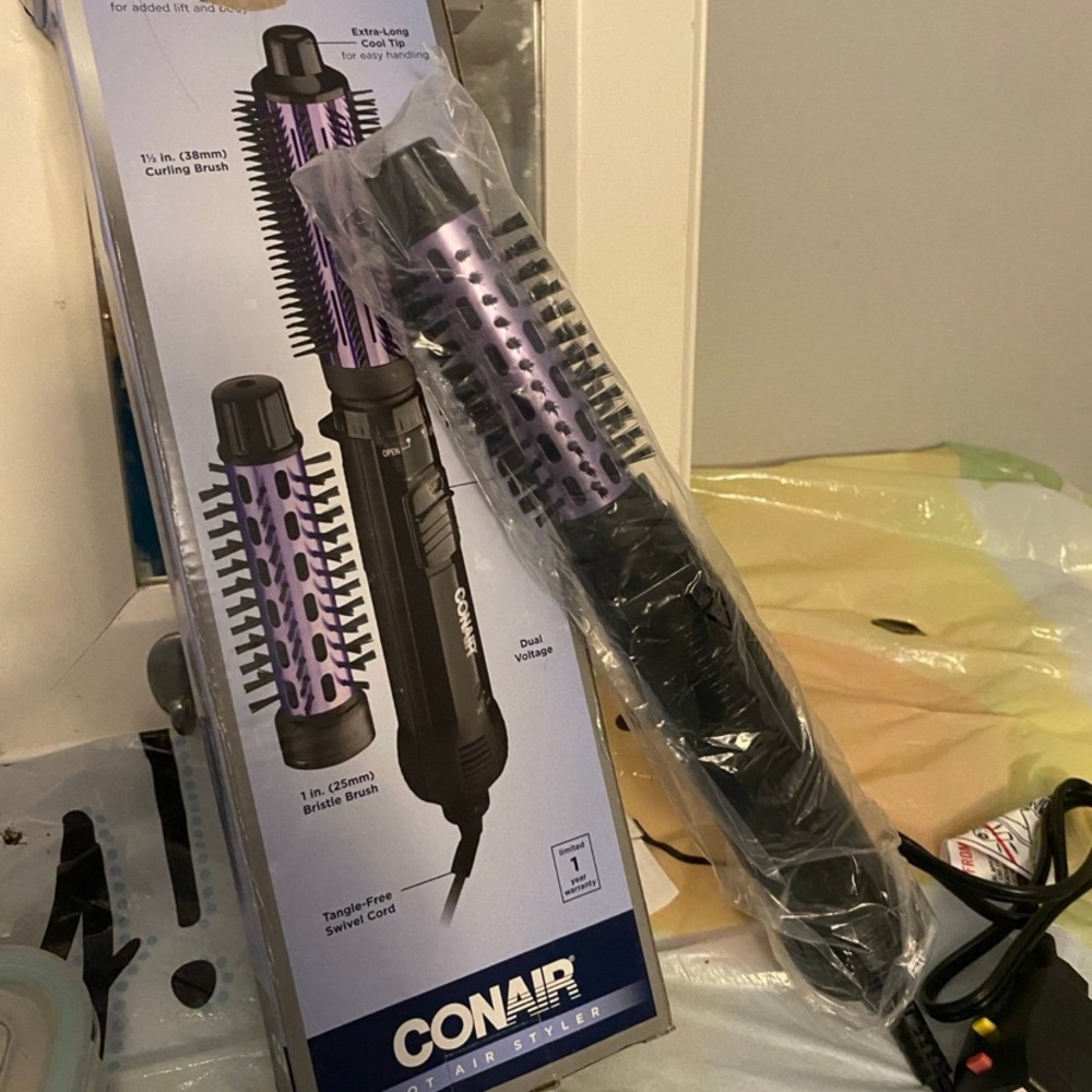 Conair Purple and Black only bristle Brush it’s the same as in the plastic bag
